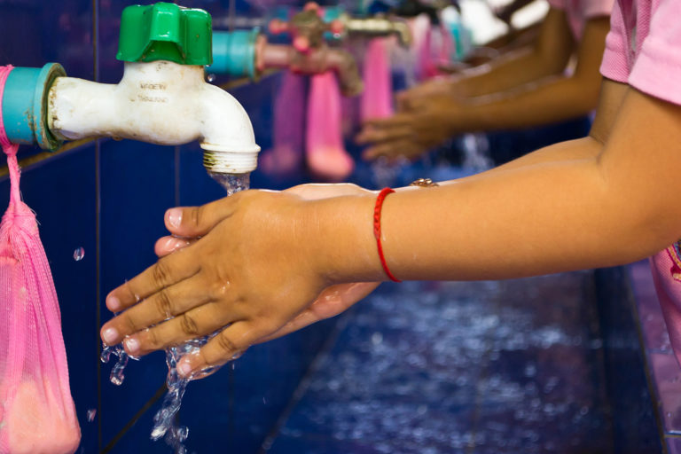 School children washing hands.