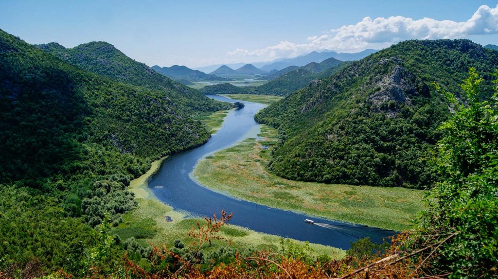 River winding between green hills