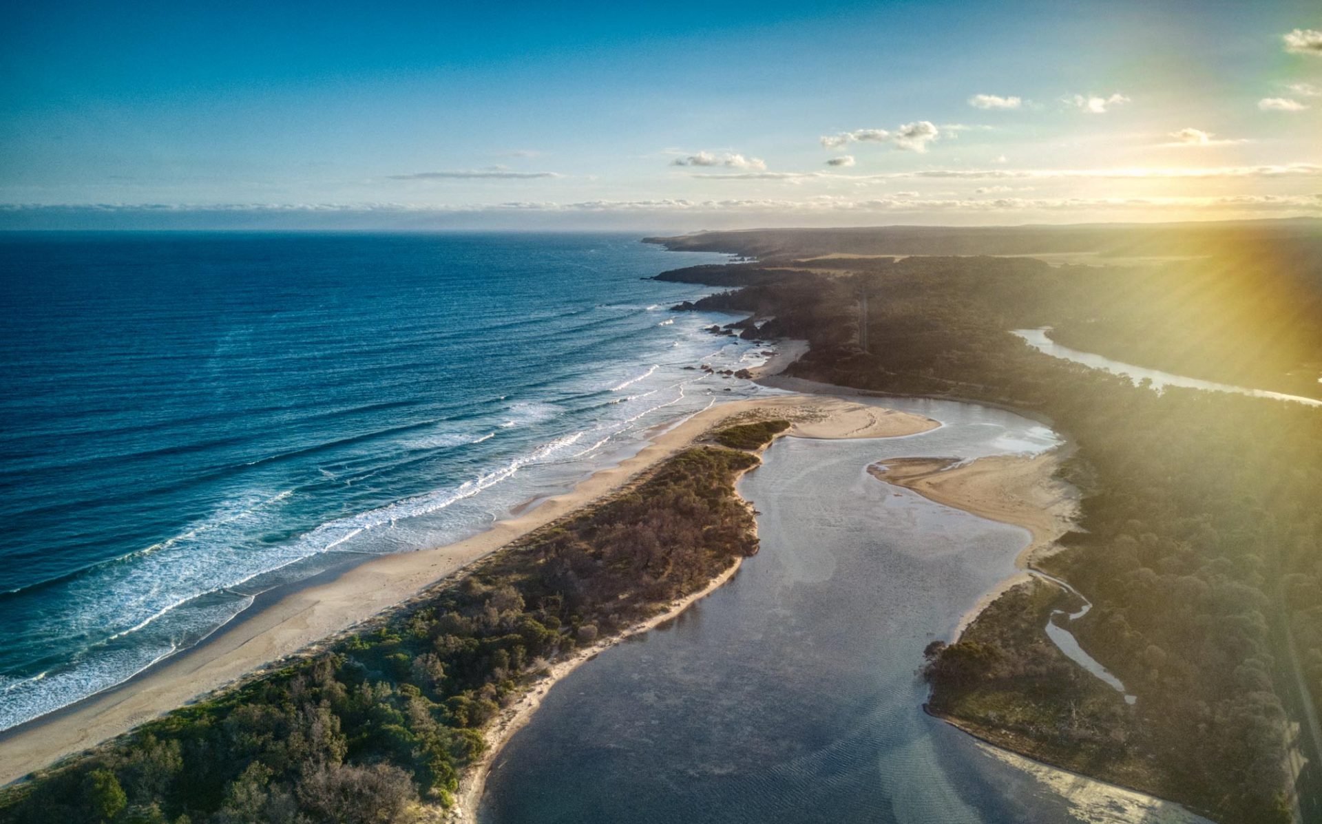 Aerial view of the Bekta river mouth, meeting the ocean in Victoria, Eastern Australia