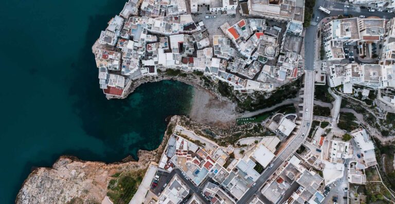 Aerial image of a river mouth in a built up town.